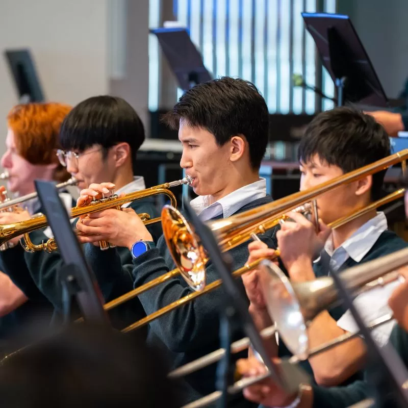 Co-curricular activities - Pakūranga College student playing the trumpet in band