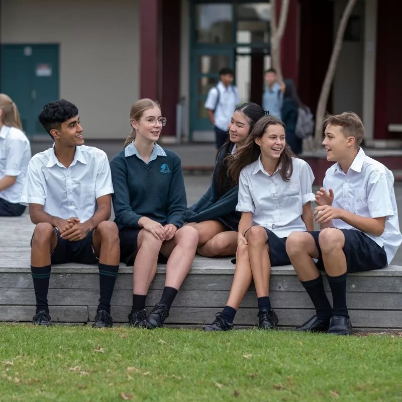 Student support - students talking outdoors at lunchtime