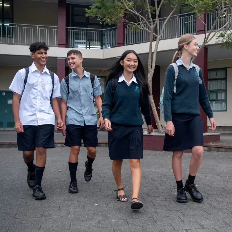 Students in uniform heading back to school