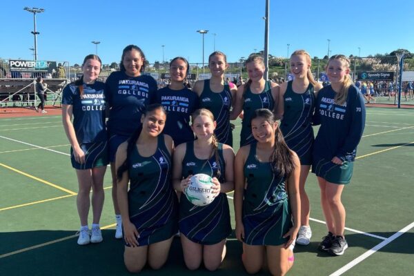 2 The Premier Girls' Netball team smiling after their game