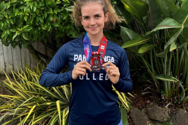 4 Pakūranga College student Margot Schmidt, holding a medal