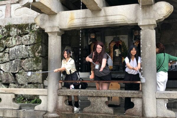 6 Students collecting water traditionally in Japan