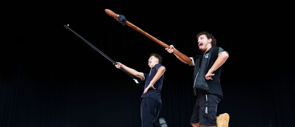 Māori student and teacher perform