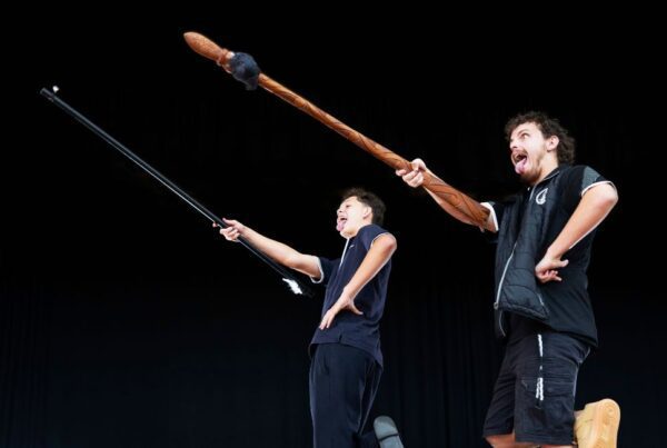 Māori student and teacher perform